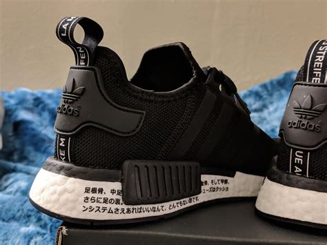 adidas nmd japan black fake|Adidas sneakers with japanese writing.